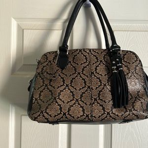 Black and tan handbag